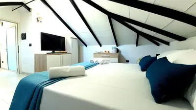Letto o letti in una camera di Linda's House