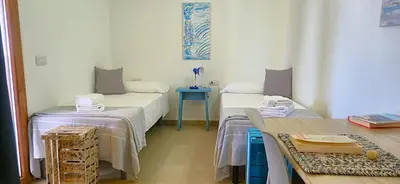 Letto o letti in una camera di Attico La Fenice