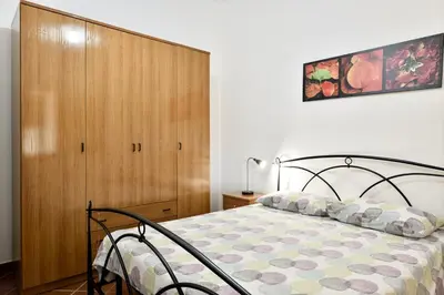 Letto o letti in una camera di Giardino Vista Mare