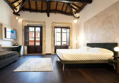 Letto o letti in una camera di Domo Efis