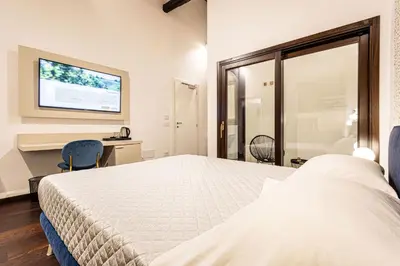 Letto o letti in una camera di Domo Efis