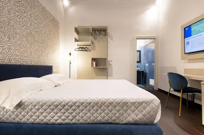 Letto o letti in una camera di Domo Efis