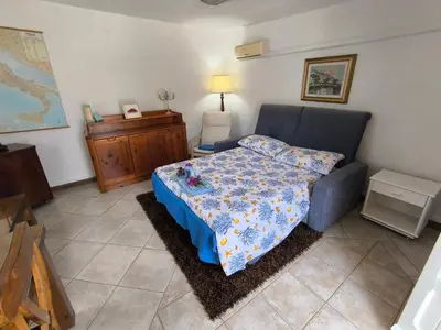 Letto o letti in una camera di Indigo Moon
