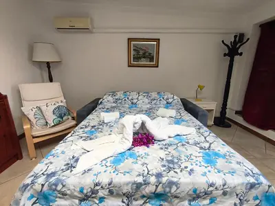 Letto o letti in una camera di Indigo Moon