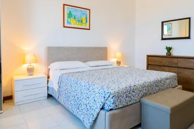 Letto o letti in una camera di Villa Fausta