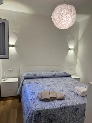 Letto o letti in una camera di Casa di Bianca