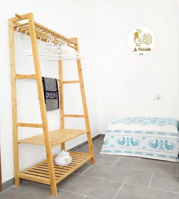 Letto o letti in una camera di La Pavoncella