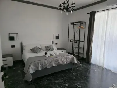 Letto o letti in una camera di La Piuma Cagliari