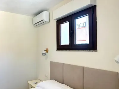 Letto o letti in una camera di B&B Magusada
