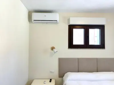 Letto o letti in una camera di B&B Magusada