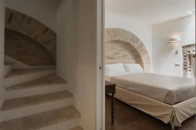 Letto o letti in una camera di Il Gallo Bianco