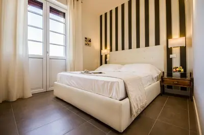Letto o letti in una camera di Il Gallo Bianco