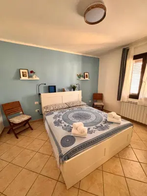 Letto o letti in una camera di Casa Agata - La Casa in Sardegna