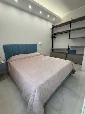 Letto o letti in una camera di Suite Mameli
