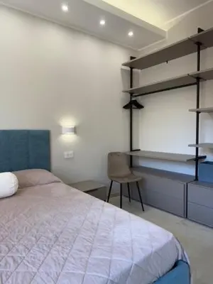 Letto o letti in una camera di Suite Mameli