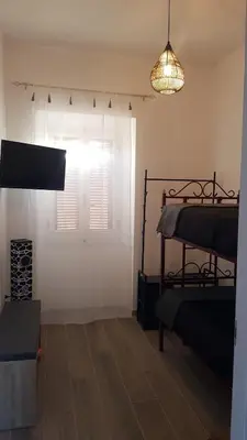 Letto o letti in una camera di Deliziosa Casa Gonnesa
