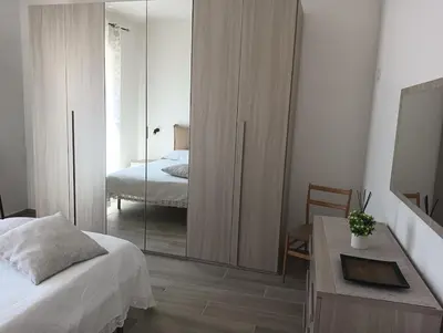 Letto o letti in una camera di Deliziosa Casa Gonnesa