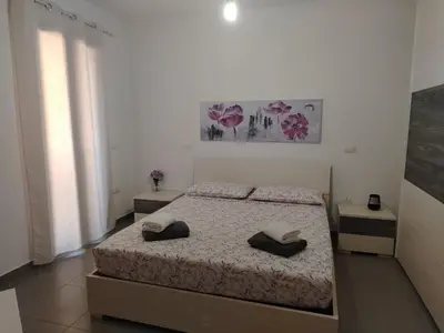 Letto o letti in una camera di Casa del Minatore