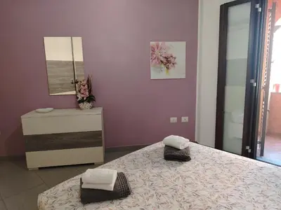 Letto o letti in una camera di Casa del Minatore