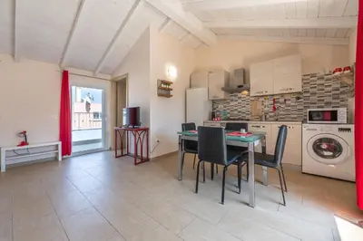 Cucina o angolo cottura di Domu Balilla Cozy Loft with a panoramic terrace