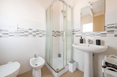 Bagno di Domu Balilla Cozy Loft with a panoramic terrace