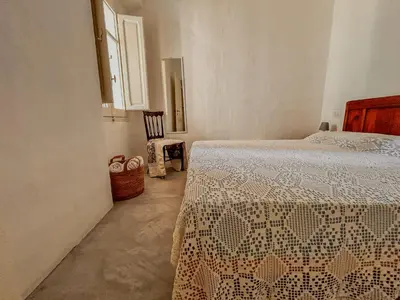Letto o letti in una camera di Borgo Ferraria