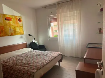 Letto o letti in una camera di Artemisia