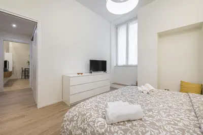 Letto o letti in una camera di Maison Galilei