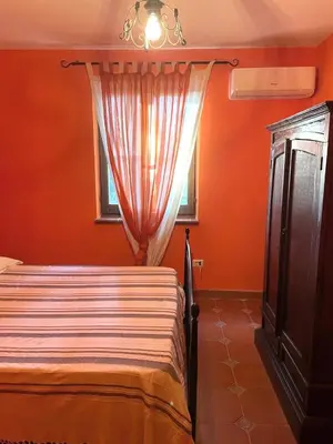 Letto o letti in una camera di Casa Monti