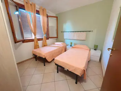 Letto o letti in una camera di Domu Nova