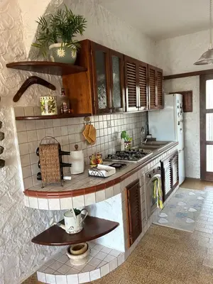 Cucina o angolo cottura di Terrace with dreamy sunset Cala Sapone