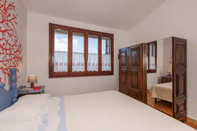 Letto o letti in una camera di Battistina Holiday Home