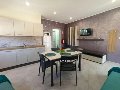 Cucina o angolo cottura di Le Nonne HOUSE - Assemini - free parking P