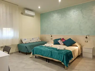 Letto o letti in una camera di Le Nonne HOUSE - Assemini - free parking P