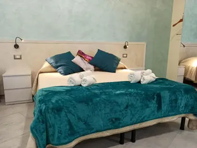 Letto o letti in una camera di Le Nonne HOUSE - Assemini - free parking P
