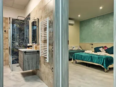 Letto o letti in una camera di Le Nonne HOUSE - Assemini - free parking P
