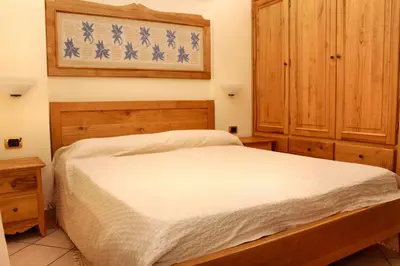 Letto o letti in una camera di Antica Palazzina Lamarmora 1