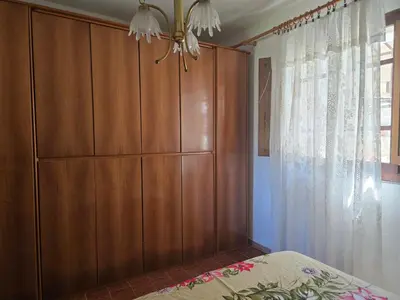 Letto o letti in una camera di Casa Dina