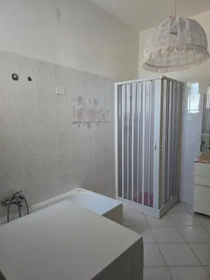 Letto o letti in una camera di Casa Dina
