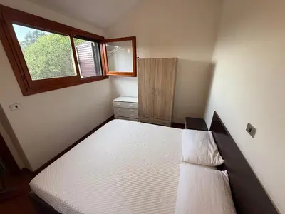 Letto o letti in una camera di Casa Vacanze Torre dei Corsari
