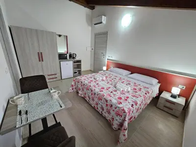 Letto o letti in una camera di Mare Fuori