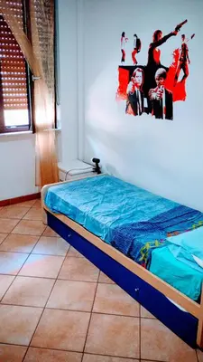 Letto o letti in una camera di SunnyDays