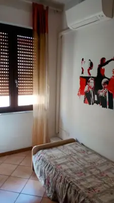 Letto o letti in una camera di SunnyDays