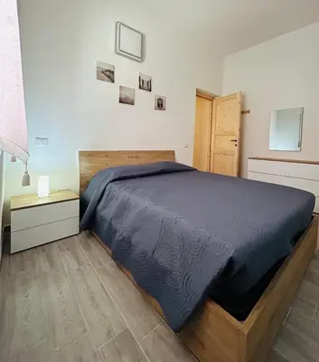 Letto o letti in una camera di Fior di Mirto