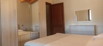 Letto o letti in una camera di Casa America