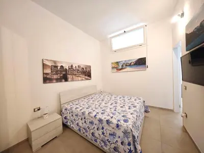 Letto o letti in una camera di Casa Billa - Carloforte