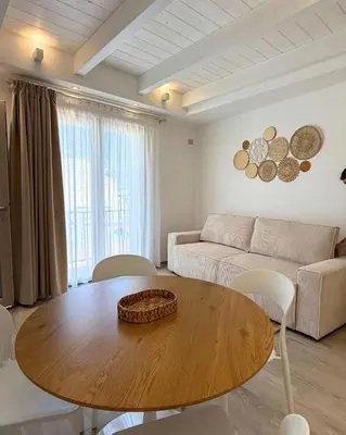 Area soggiorno di Calèma Apartments