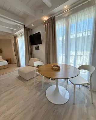 TV o dispositivi per l'intrattenimento presso Calèma Apartments