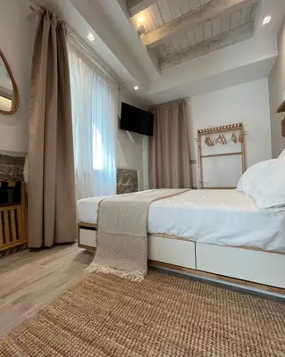 Letto o letti in una camera di Calèma Apartments