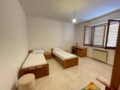 Letto o letti in una camera di Vista mare a Sant'Antioco